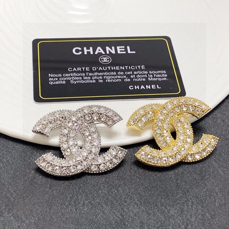 Ch*el brooches